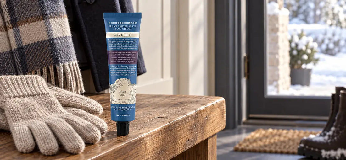 ROOPY hand cream with winter gloves by a snowy entryway