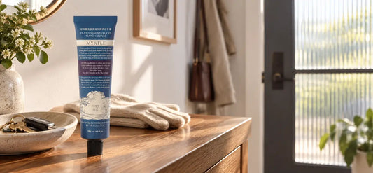 ROOPY hand cream beside keys and gloves in a sunlit entryway